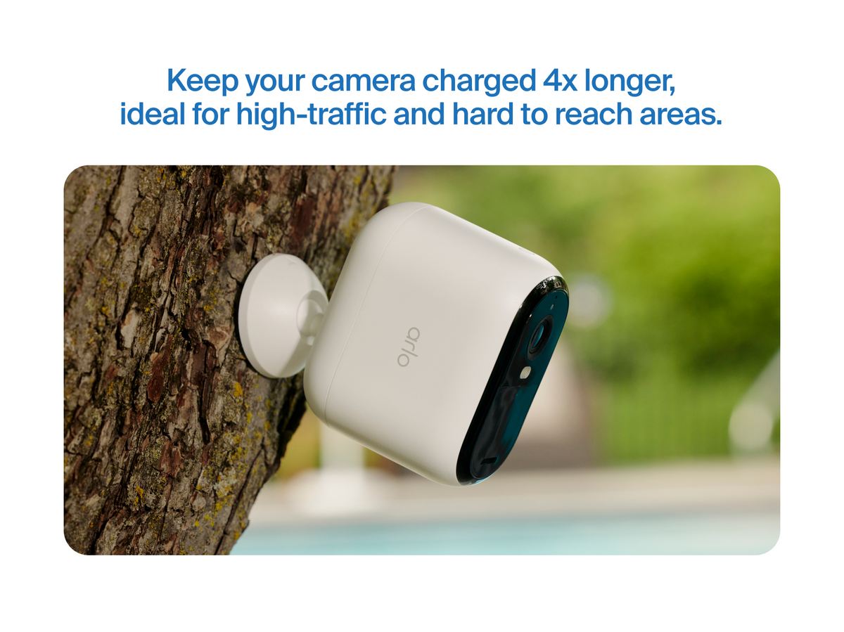Arlo Essential 3rd Gen XL camera mounted on a tree outside