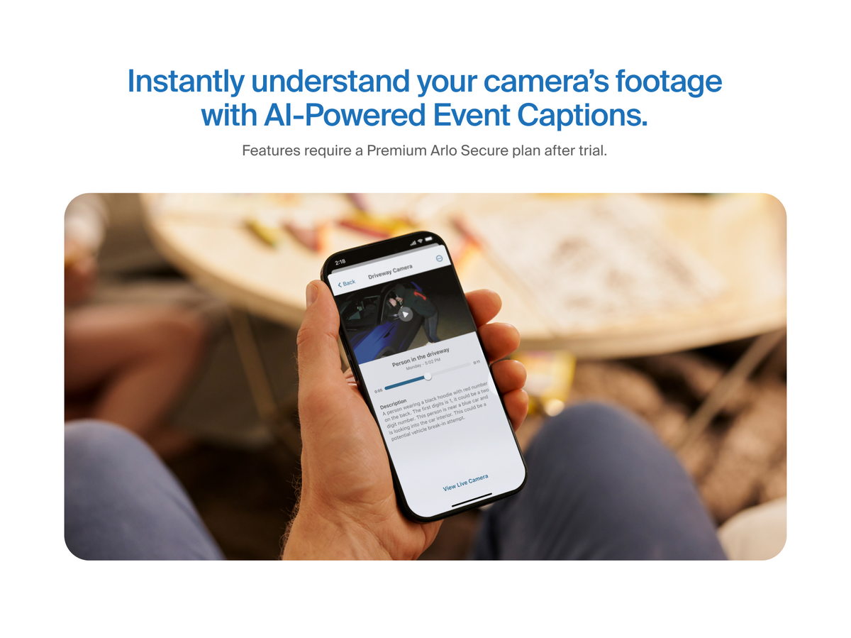 A person holding a phone with Event Captions on the screen