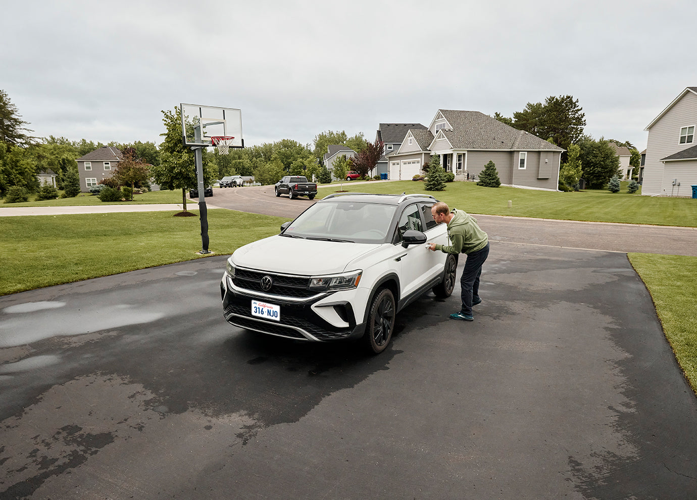 A man trying to break into a car
