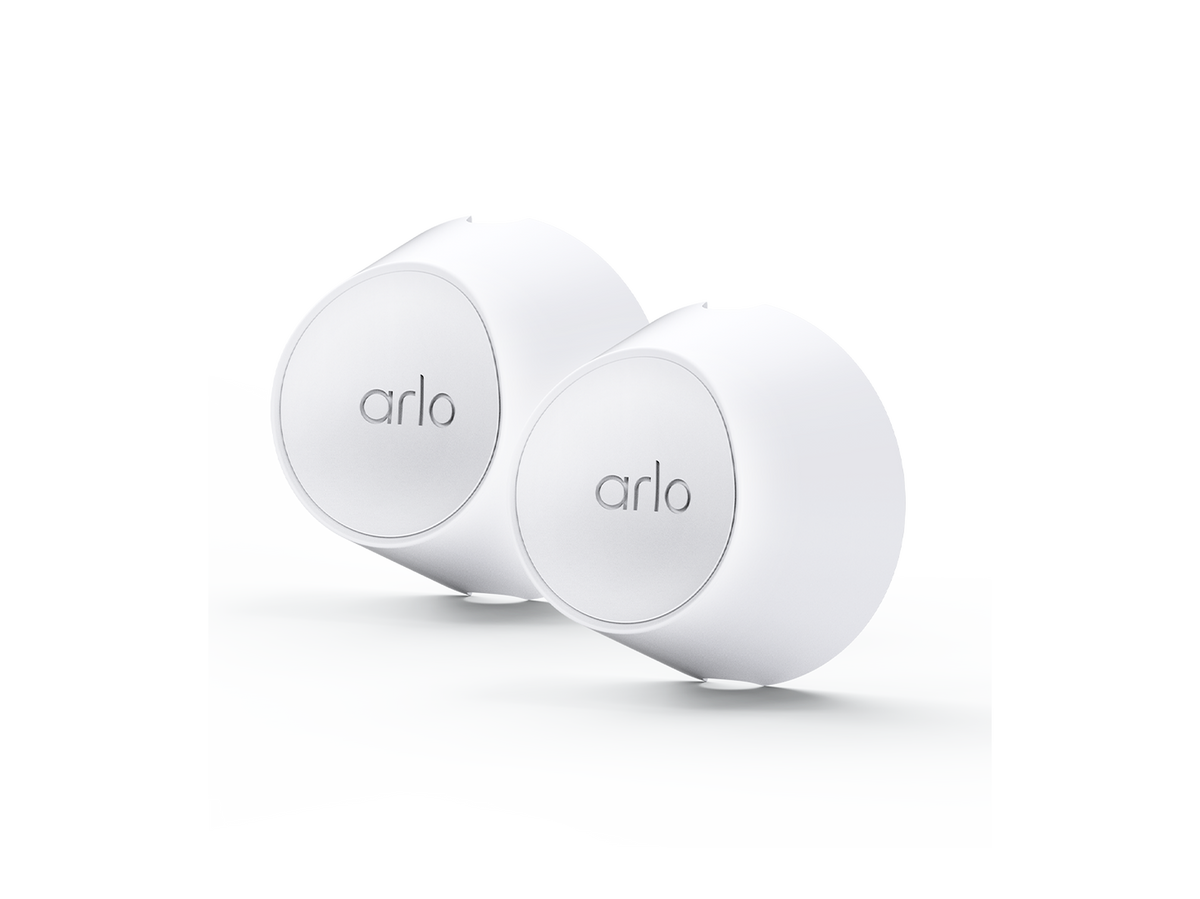 Two white magnetic wall mounts