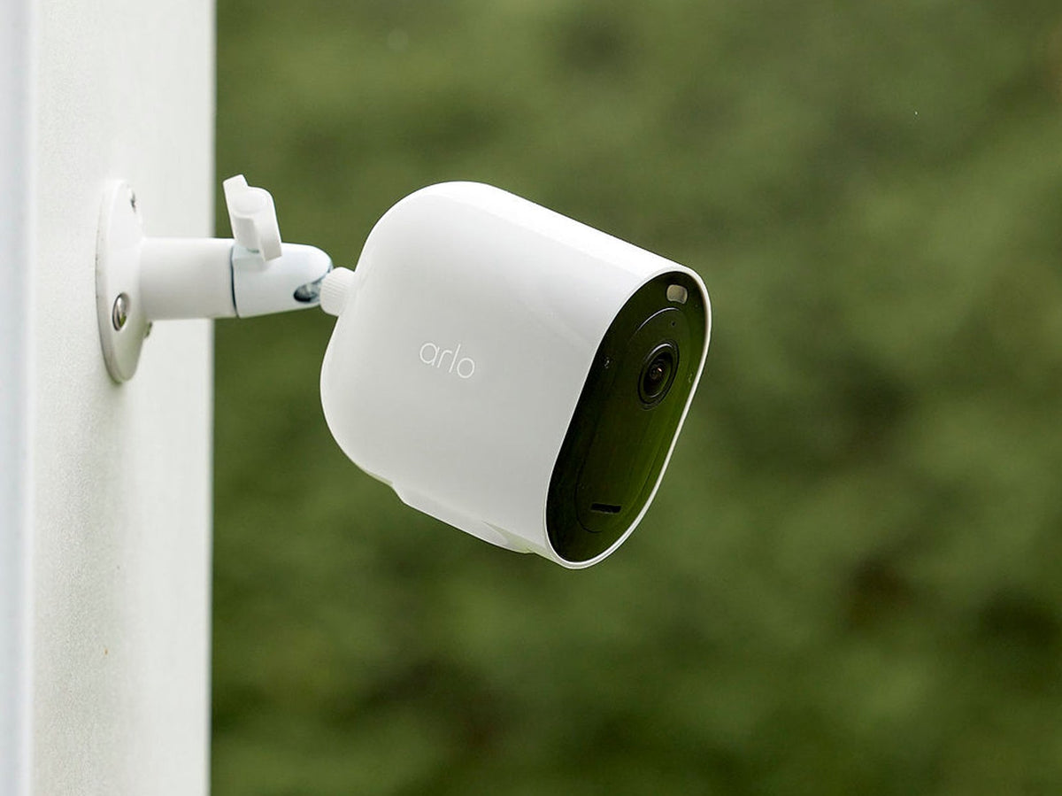 Arlo Pro 6 camera mounted on side of house
