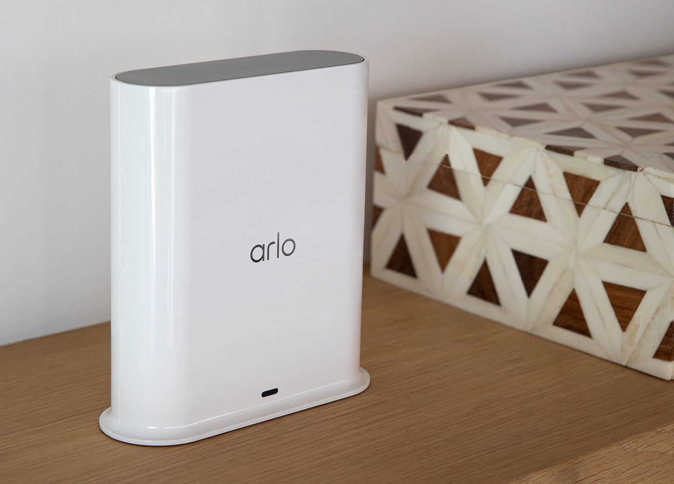 Arlo Smarthub on top of table