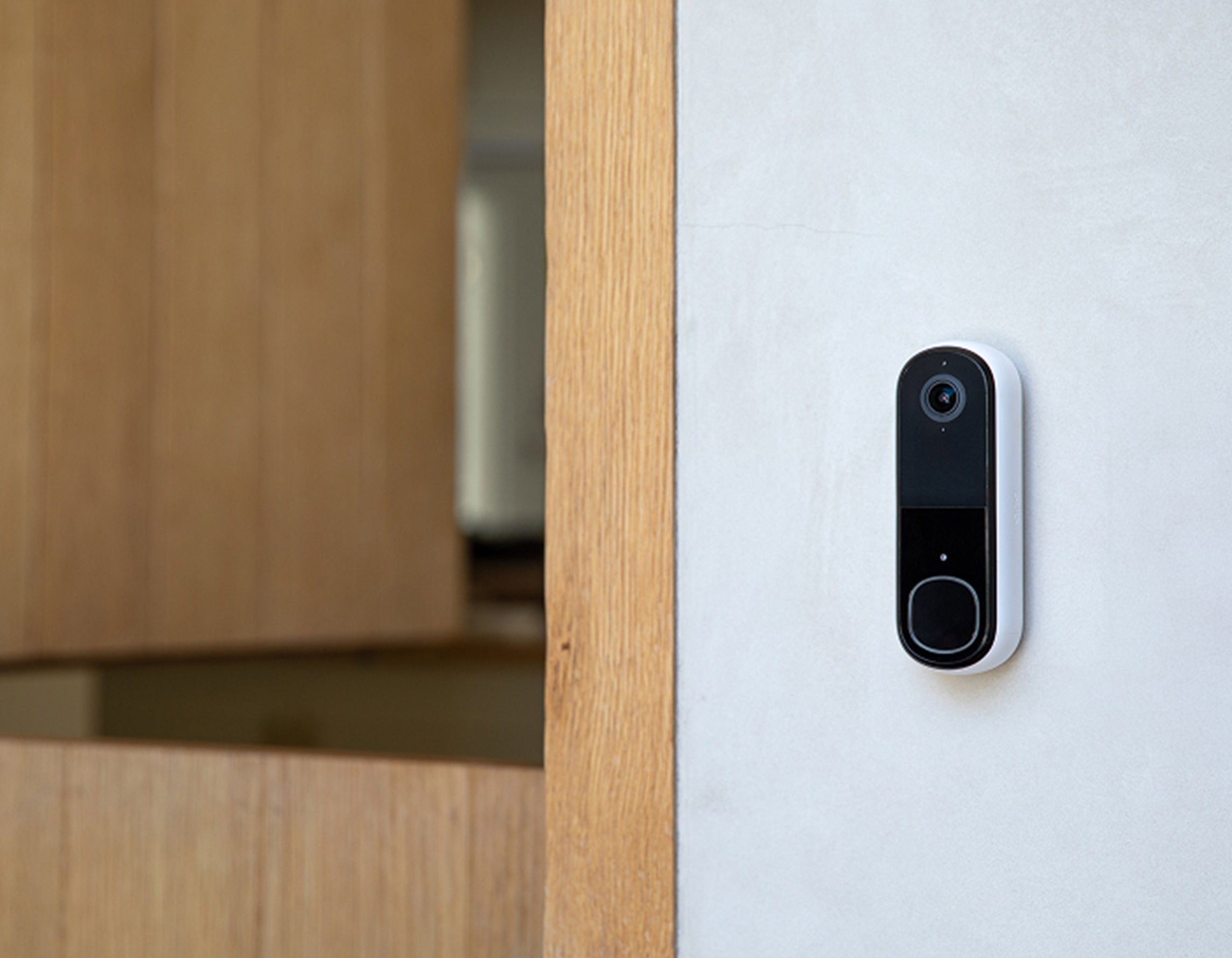Arlo Video Doorbell mounted next to front door