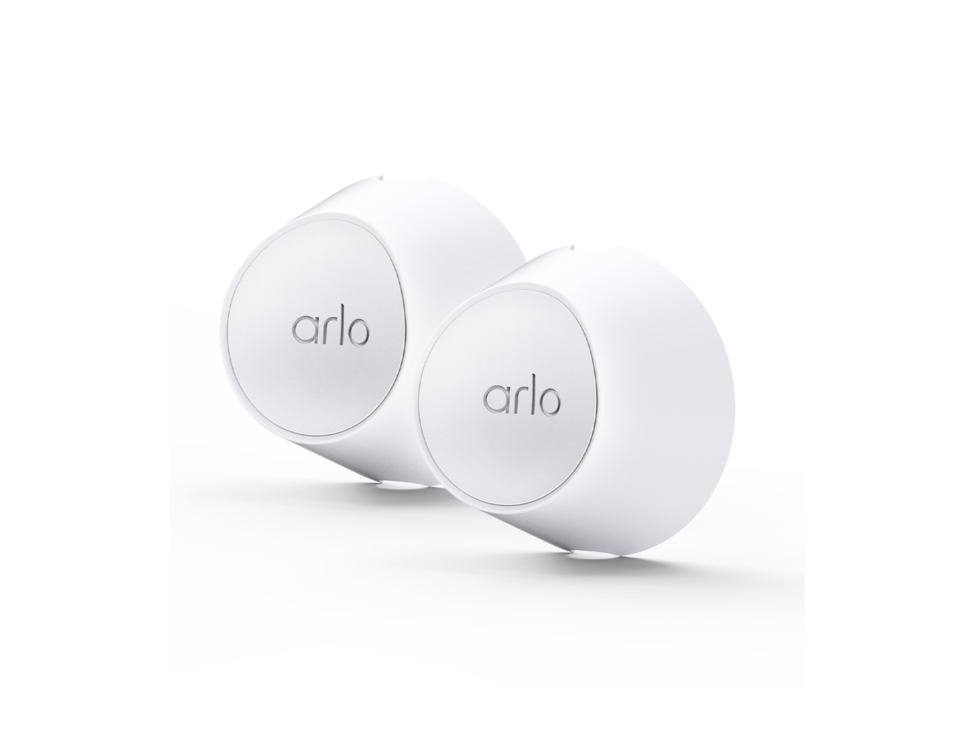 Two white magnetic wall mounts