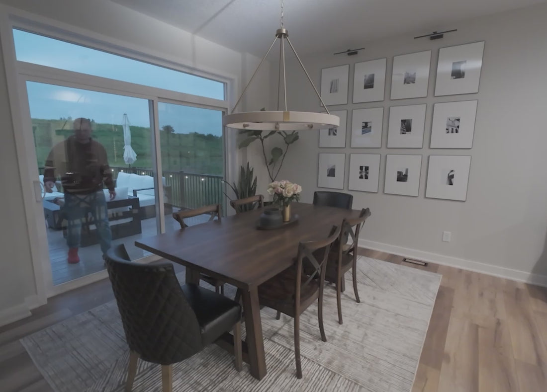 A burglar trying to enter through a sliding glass door and then leaving