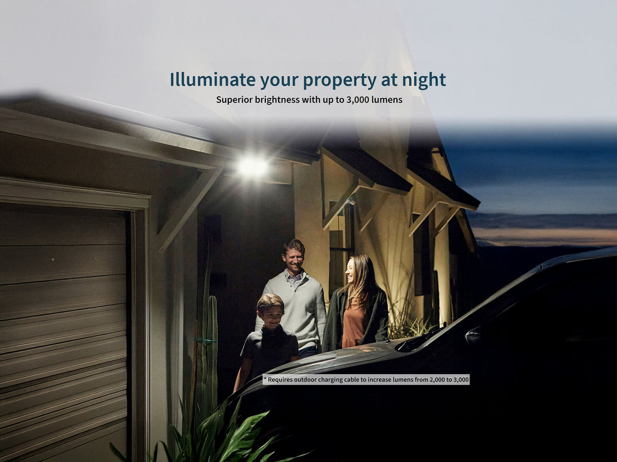 Family walking to car with Arlo Wireless Floodlight on