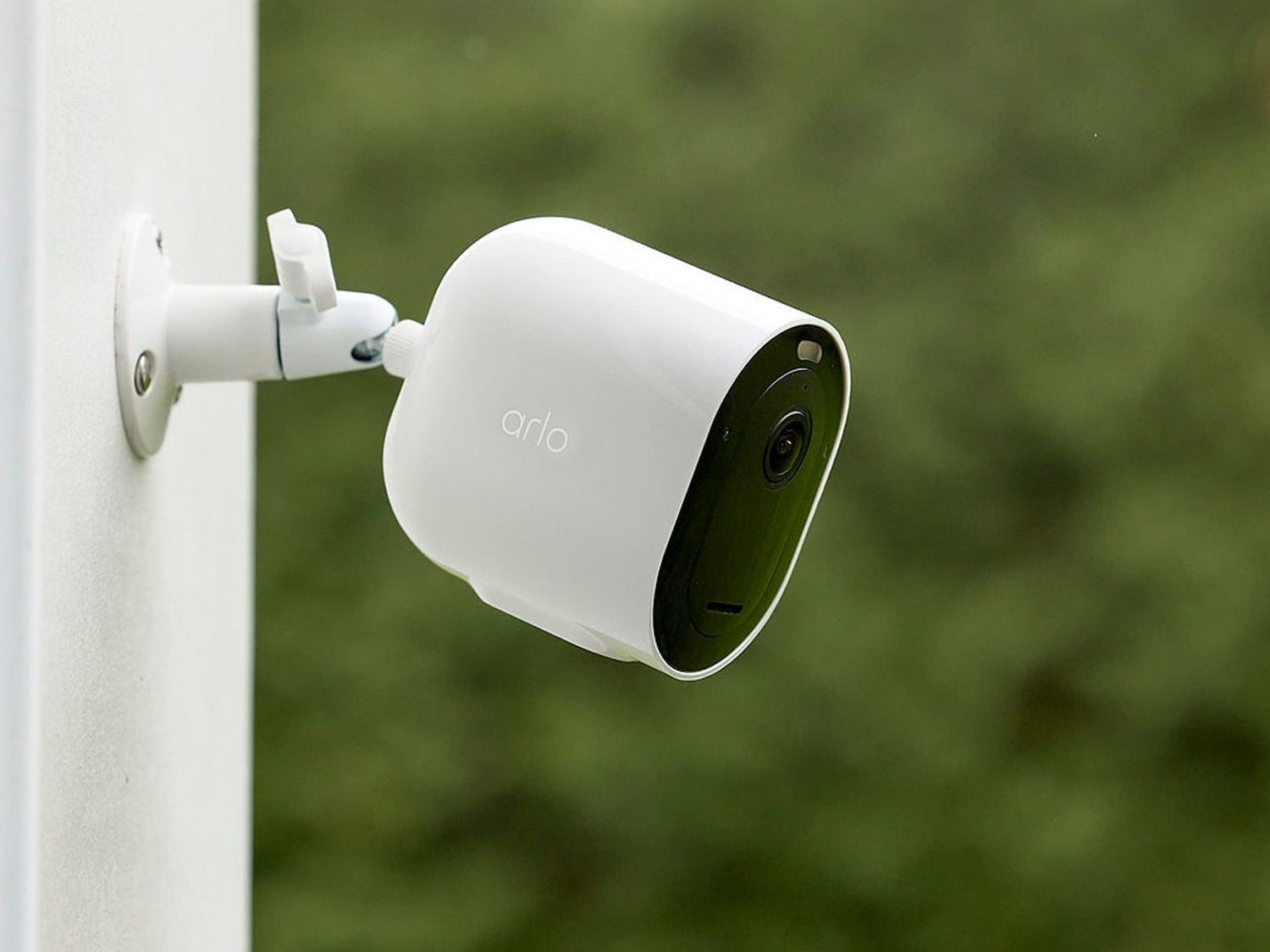 Arlo Pro 6 camera mounted on side of house