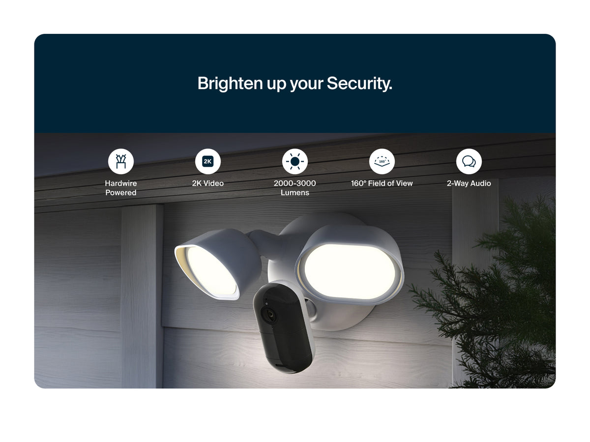 A Arlo Wired floodlight, mounted on a gray house exterior at night. The image includes a dark blue header with the text 'Brighten up your Security.