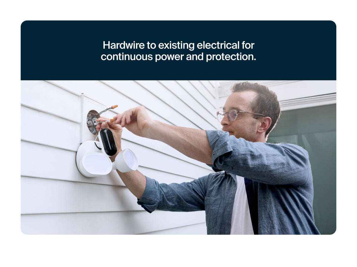 Person installing electrical hardware on a wall with text about continuous power and protection.