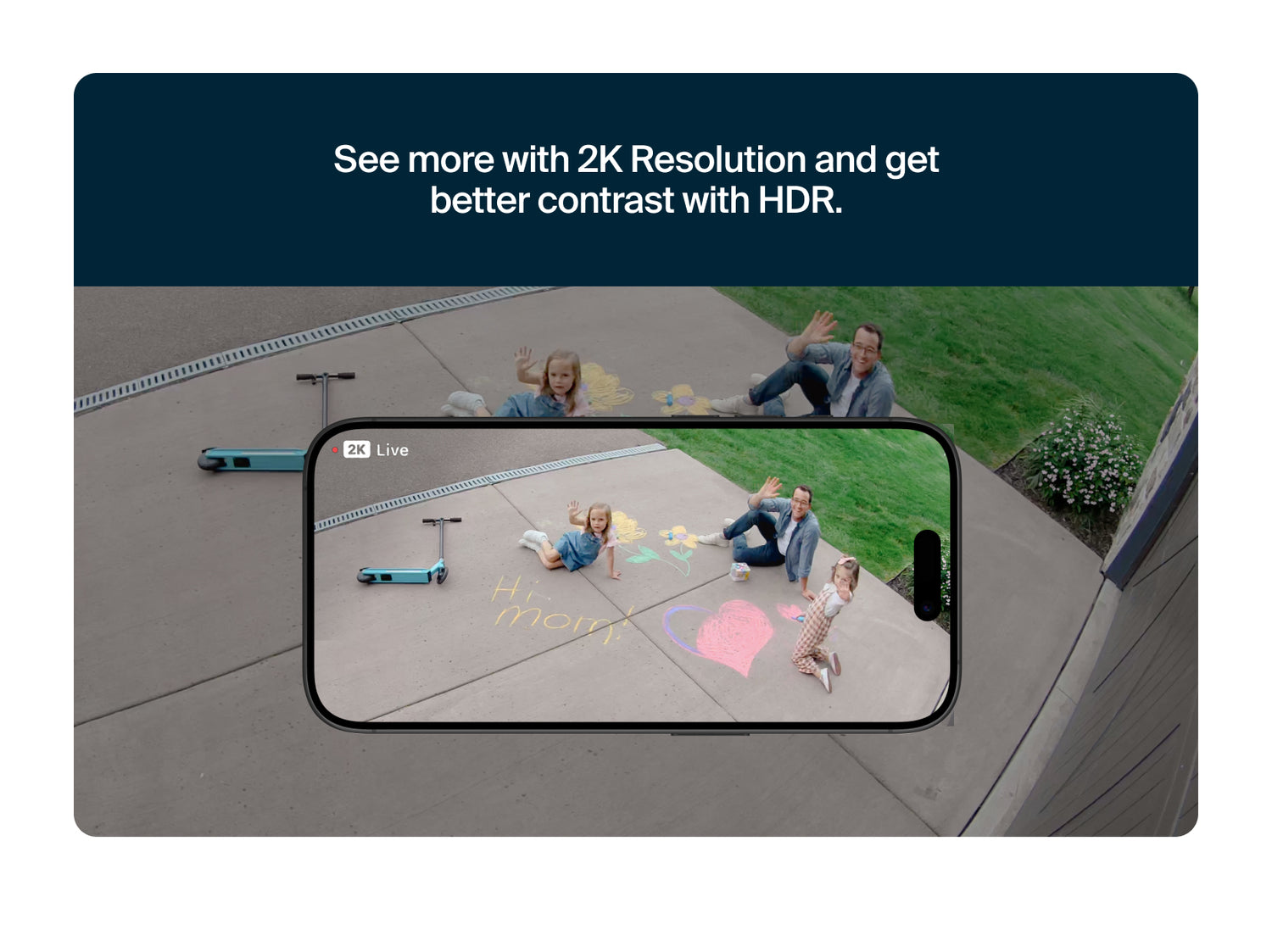 Phone screen showing a video call with people on a sidewalk, with text about 2K resolution and HDR.